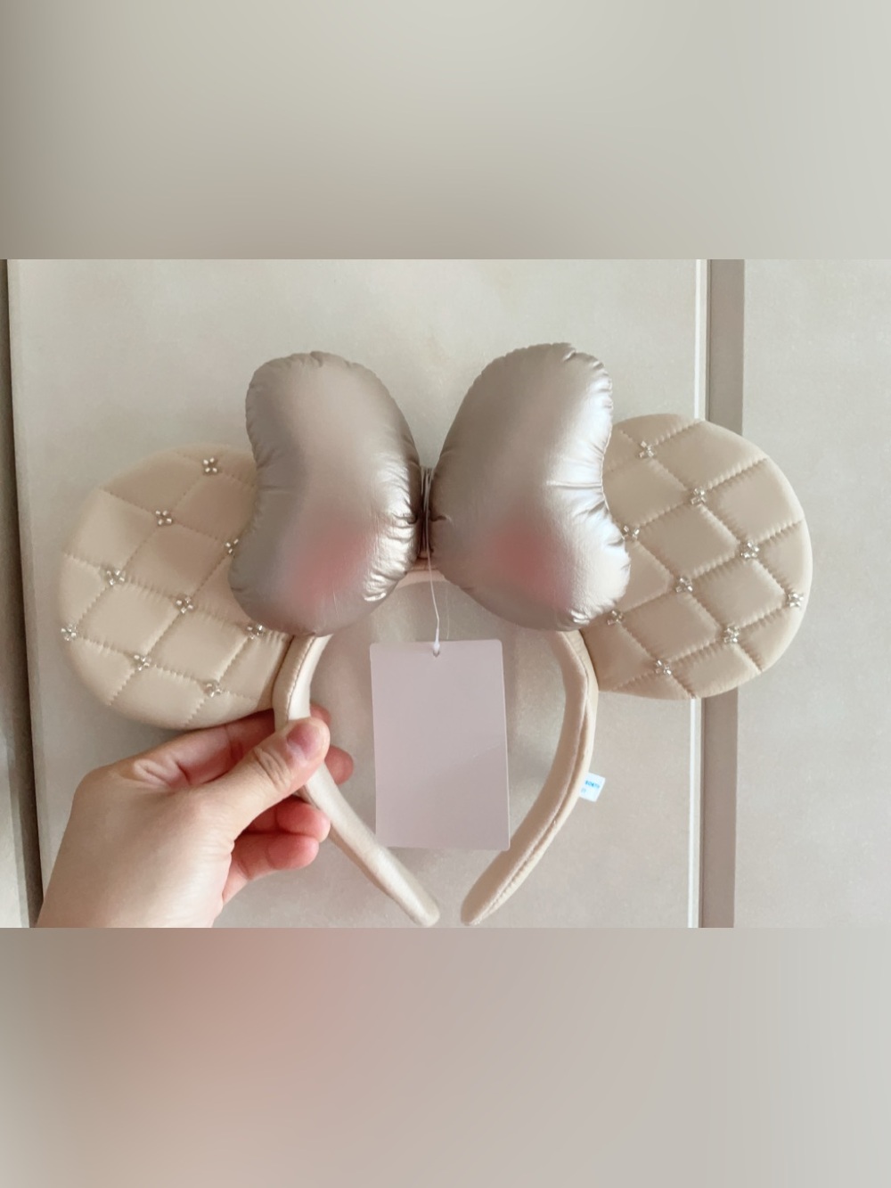 Quilted Pearl-Embellished Ear Headband with Metallic Champagne Bow